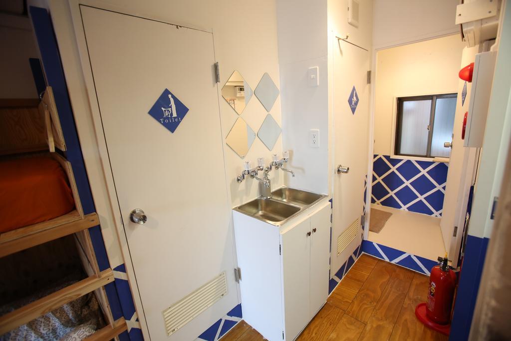Yadoya Guest House Orange Tokio Habitación foto